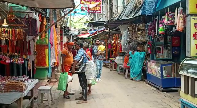 महंगाई की मार झेल रहे श्रावणी मेले के दुकानदार, नहीं हो रही सामानों की खरीद बिक्री  
