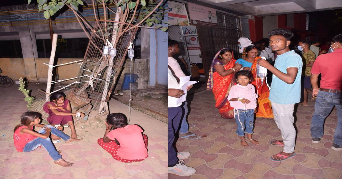 एक साथ सौ मरीज पहुंचे तो धनबाद के SNMMCH में मची अफरा-तफरी,पेड़ पौधों पर स्लाइन टांगकर जानिए कैसे होने लगा इलाज 