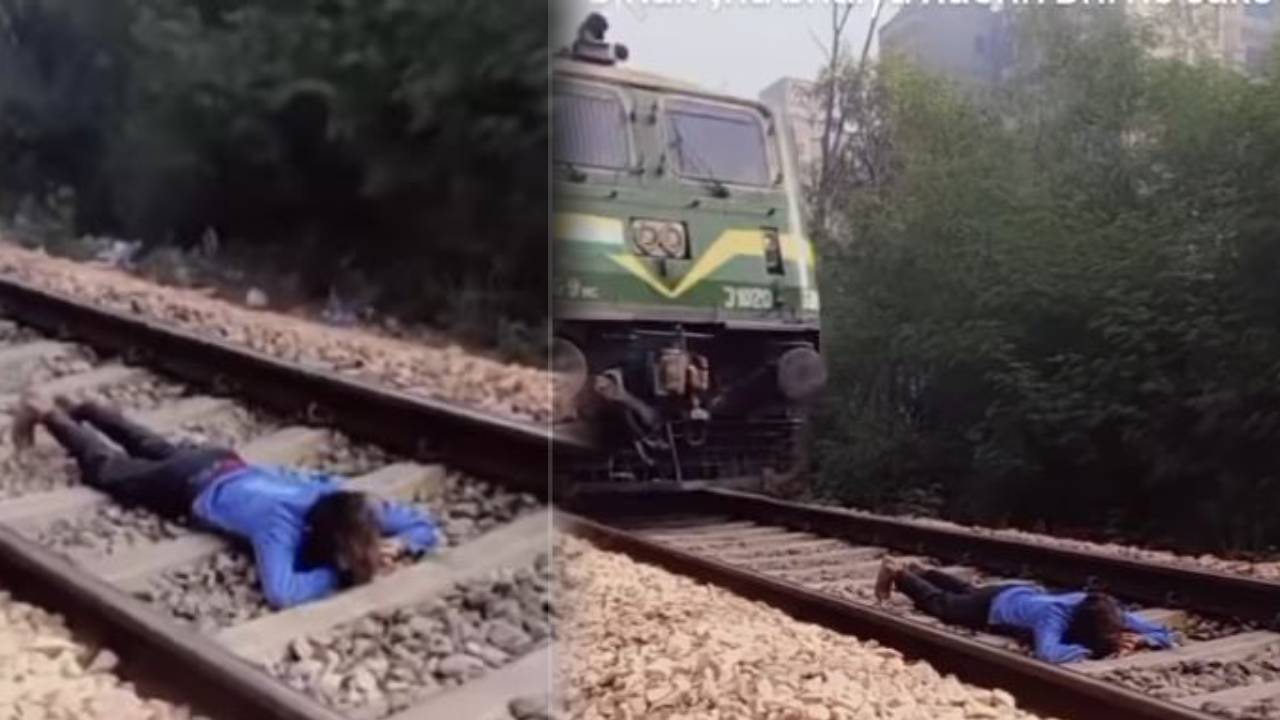 रेल की पटरी पर लेटा रहा युवक ऊपर से चल गई ट्रेन, लड़के का खतरनाक स्टंट देख यूजर्स कह रहे, ‘बहुत अफसोस है कि आप बच गए...’