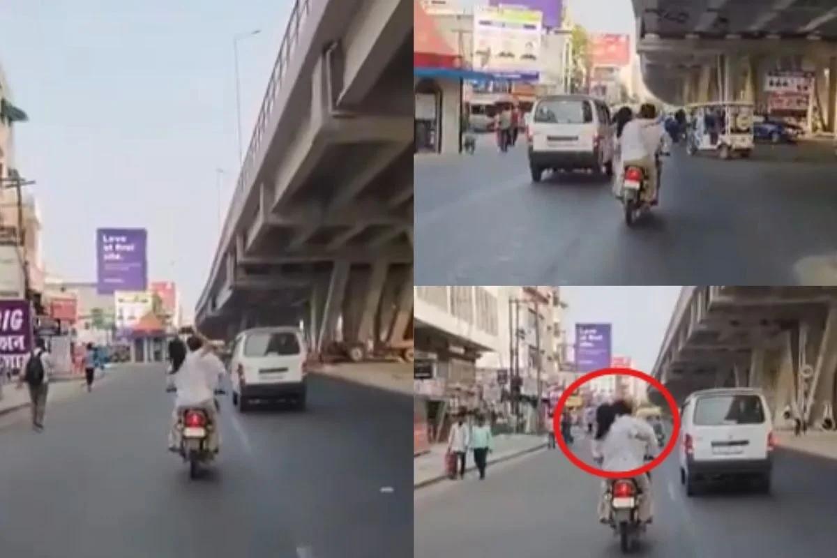 Viral Video: चलती बाइक पर महिला शख्स पर बरसाते रही चप्पल, लोग बोले- घोर कलयुग...मर्द कल भी बेचारा था और आज भी लाचार है