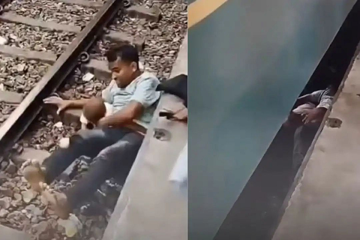 बेटे की जान बचाने के लिए ट्रेन के नीचे कूदा बाप, आगे का मंजर देख रह जाएंगे सन्न, देखिए Video 