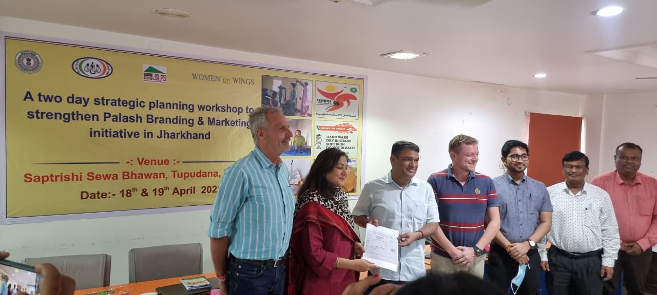 पलाश ब्रांडिंग एवं मार्केटिंग के लिए वूमेन ऑन विंग्स एवं जेएसएलपीएस में गैर वित्तीय समझौता